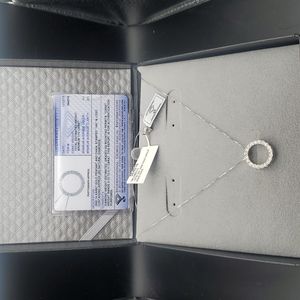 14kt Gold Pendant and Chain w/ approx 20 Diamonds .10-.11 carat